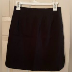 Skirt from The Loft with side zipper and small curved side slits.